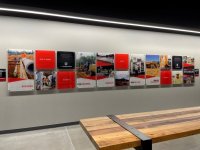 Story Wall of Signs for office space at HGC of Charlotte!