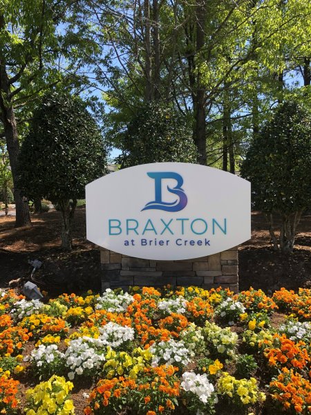 Custom Monument Sign with Brick Base and Dimensional Acrylic Graphics