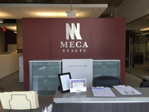 Brushed Aluminum Dimensional Letters with Vinyl Overlays on Logo