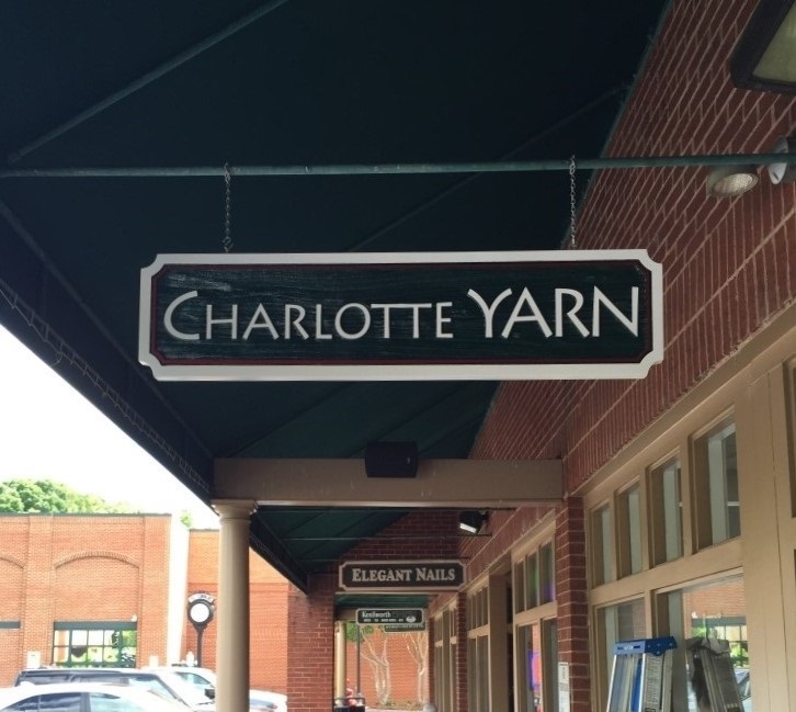 hanging signs, blade signs, exterior signs, storefront signs, shopping center signs, signs charlotte, dimensional signs, logo signs, business signs, building signs, wayfinding signs, identification signs,