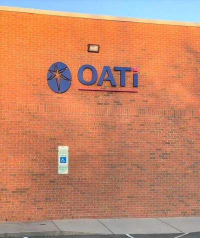 OATi Reverse Channel Letter Sign with Logo Graphic